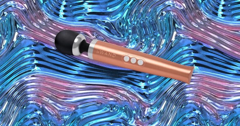 Le Wand Die Cast Vibrating Massager Abstract Background SOURCE Le Wand