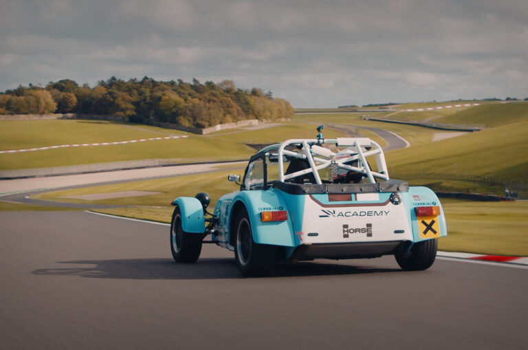 caterham academy race car on track rear