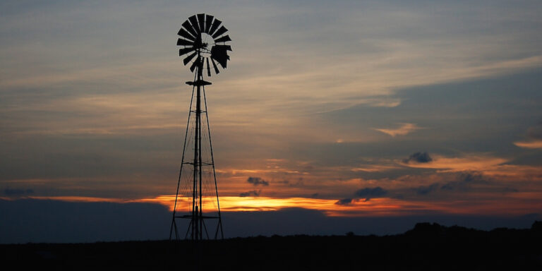 Texas ranch sunset windmill